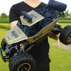 1/12 Remote Control Car 4x4 Monster Truck Rock Crawler 2.4G Off-Road Climbing Car -Children Toys Sale RC Cars For Kids 4WD Rock Crawler Climbing Remote Control Trucks 2.4G Radio Control RC Cars Buggy 2019 High speed Off Road Trucks Toys for Kids